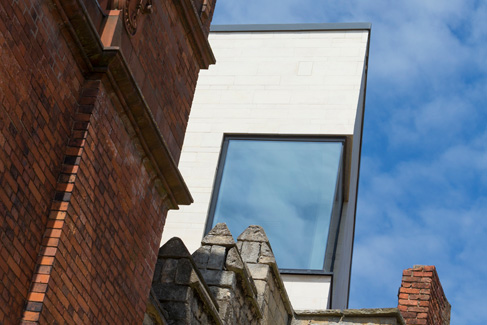 After: View North from Greestone Steps, Showing New Building Contrasting against Red Brick Watkins Building (Sept 2015)